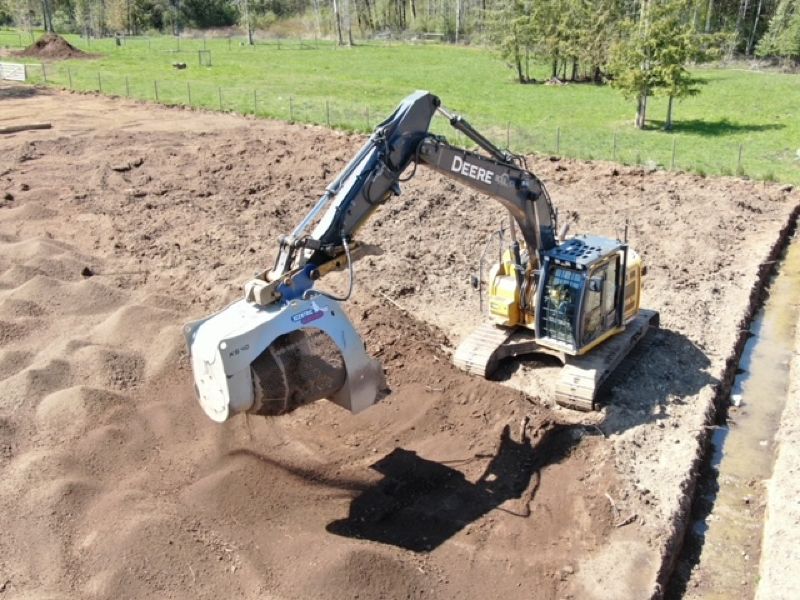 digging sand on outdoor site